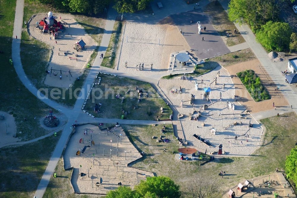 Berlin from the bird's eye view: Park with playground with sandy areas in Park on Buschkrug in Berlin, Germany