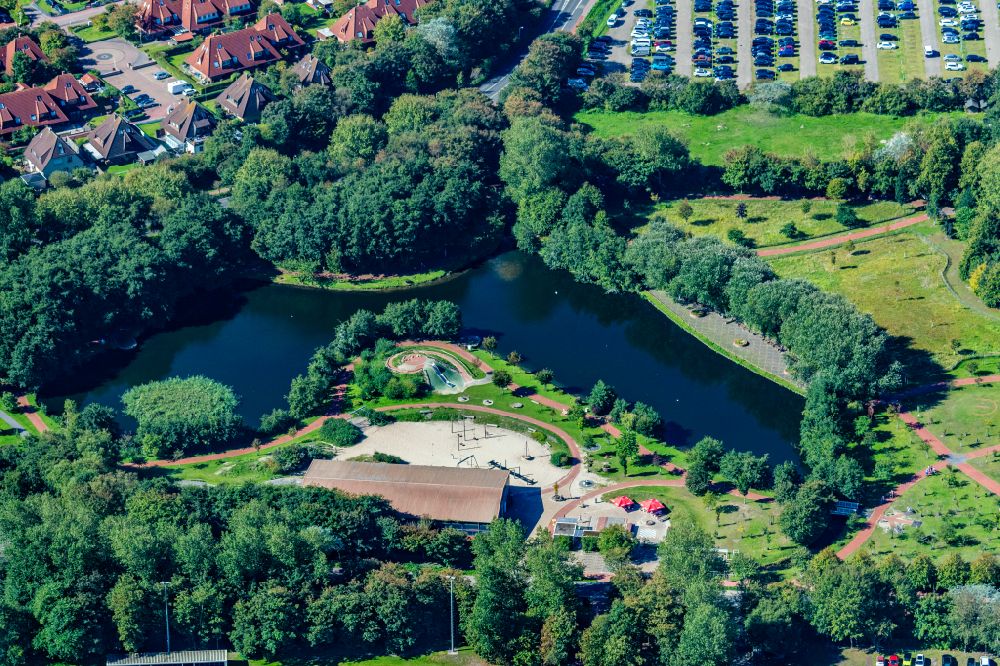 Aerial photograph Norderney - Park and playground with sandy areas with a pond and indoor play hall Kap Horn in Norderney in the state Lower Saxony, Germany