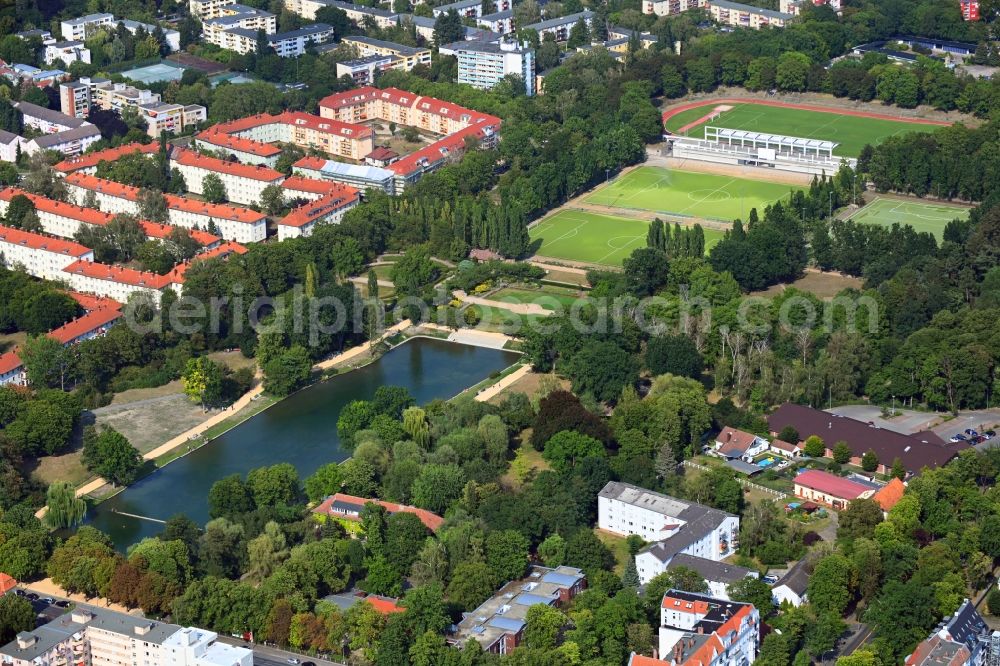 Berlin from above - Park of the Volkspark Mariendorf with ponds of the Bluemelteich and sports field ensemble on Pruehssstrasse in the district Mariendorf in Berlin, Germany
