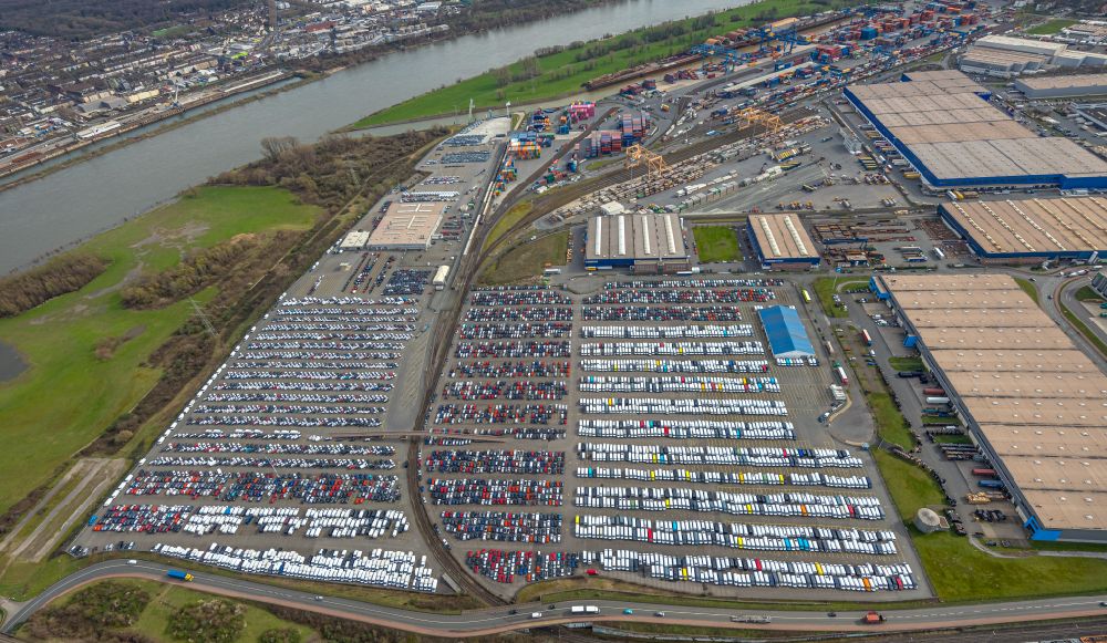 Duisburg from above - Parking lot and parking space for automobiles - passenger cars of the BLG AutoTerminal Deutschland GmbH & Co KG in the district Rheinhausen in Duisburg in the Ruhr area in the state North Rhine-Westphalia, Germany