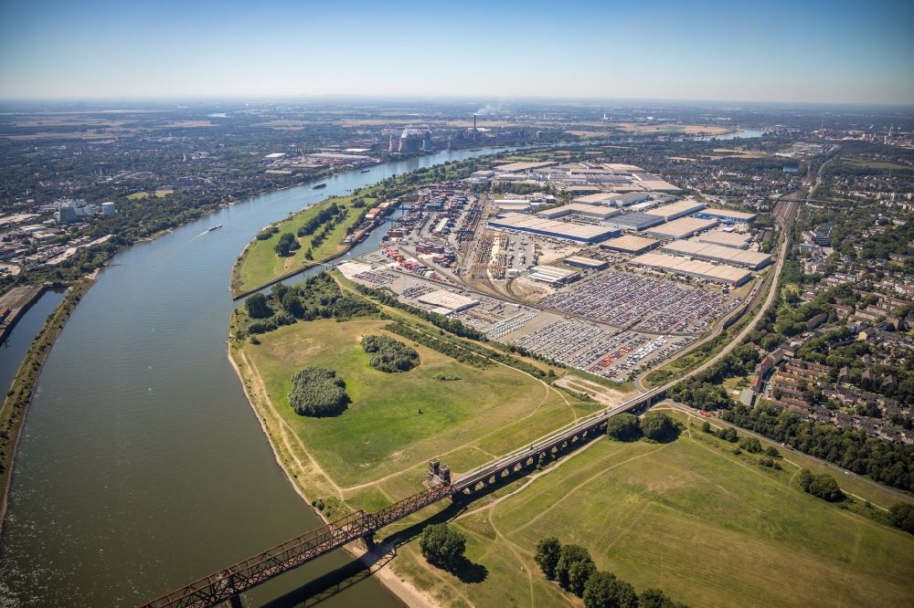 Duisburg from the bird's eye view: Parking and storage space for automobiles of BLG AutoTerminal Deutschland GmbH & Co KG in the district Rheinhausen in Duisburg in the state North Rhine-Westphalia, Germany