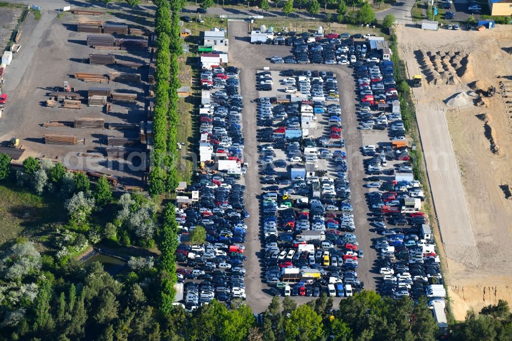 Schenkendorf from the bird's eye view: Parking and storage space for automobiles on Zeppelinring in Schenkendorf in the state Brandenburg, Germany
