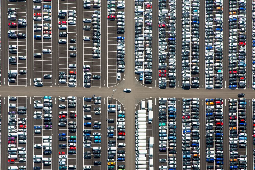Aerial photograph Zülpich - Parking and storage space for new cars Automobile in Zuelpich in North Rhine-Westphalia. Operator of the site is the Norwegian - Swedish shipping company Wallenius Wilhelmsen Logistics, which deals mainly with the global transport of cars, trucks and other rolling cargoes