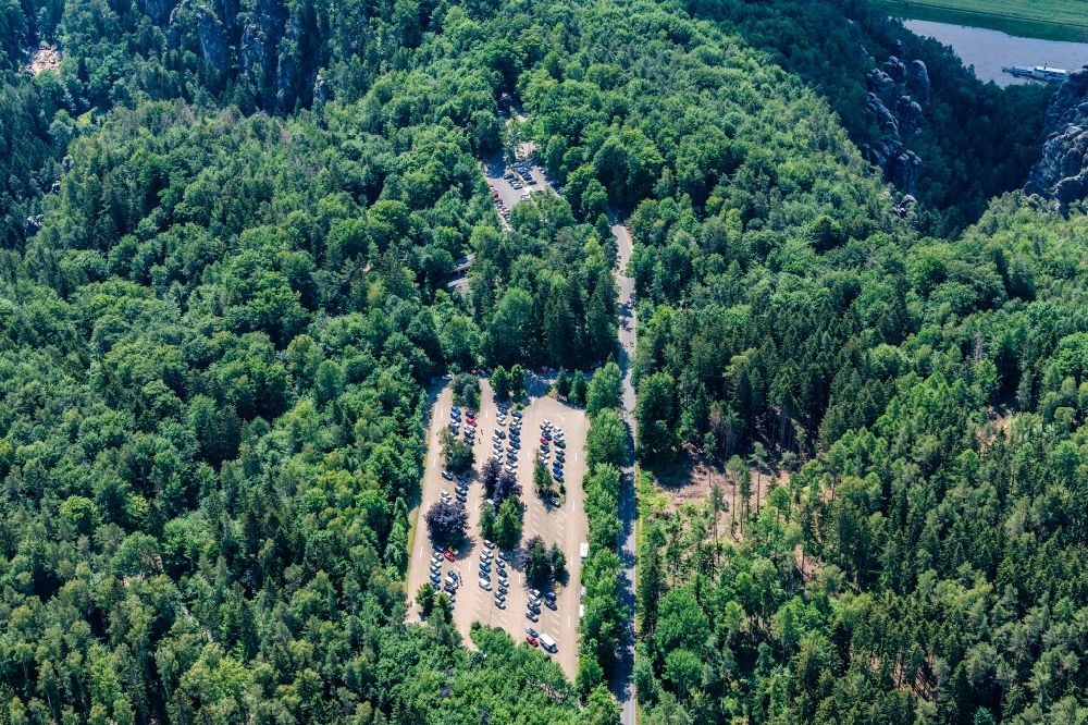 Lohmen from above - Parking lot for cars and mobile homes in the Bastei Elbe Sandstone Mountains in Lohmen in the state Saxony, Germany