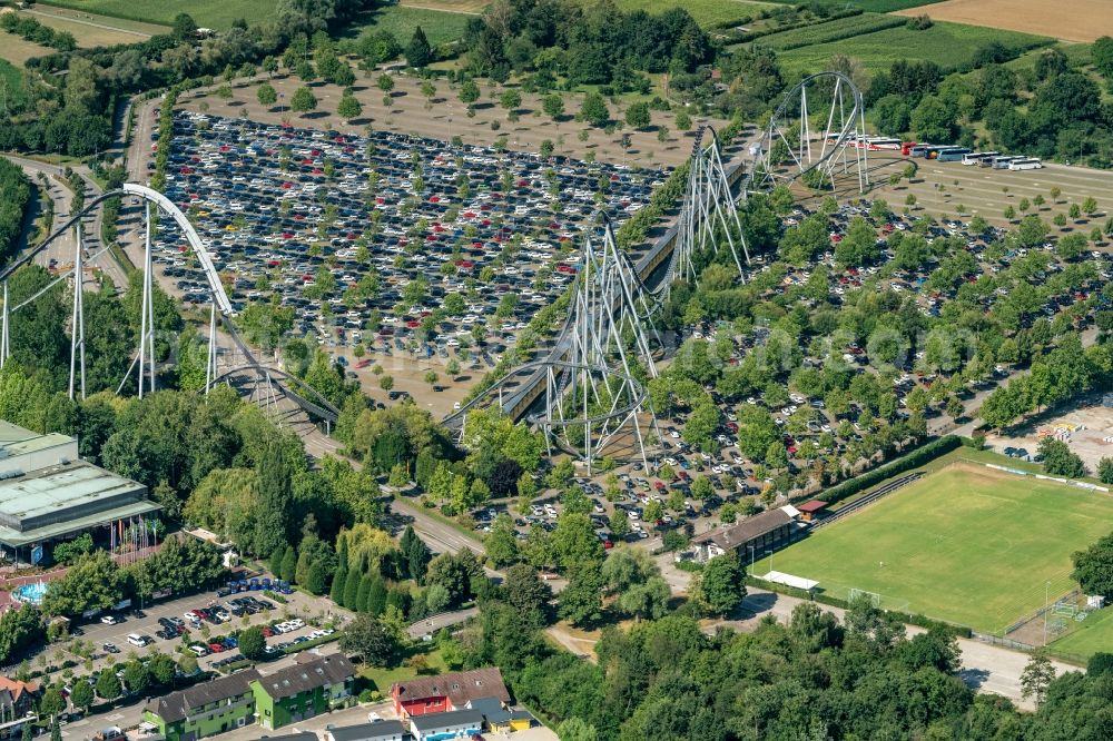 Rust from above - Car par at the amusement park and family park Europapark in Rust in Baden-Wuerttemberg with roller coasters and many attractions