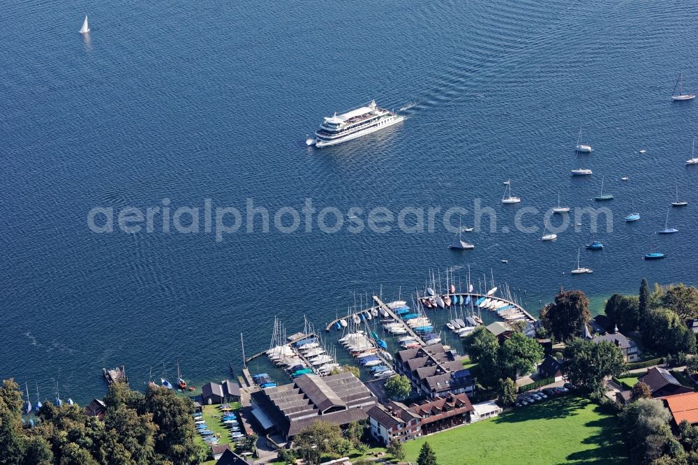 Pöcking from the bird's eye view: Passenger and passenger ship Starnberg on the Starnberger See in front of Possenhofen in the state of Bavaria. The catamaran is operated as a day excursion boat by the Bavarian lakes shipping company