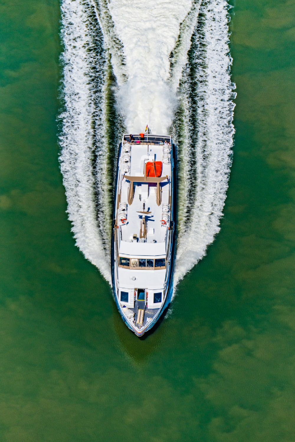 Aerial image Nordstrand - Passenger ship Adler Express at full speed near the peninsula Nordstrand in the Wadden Sea in the state Schleswig-Holstein, Germany