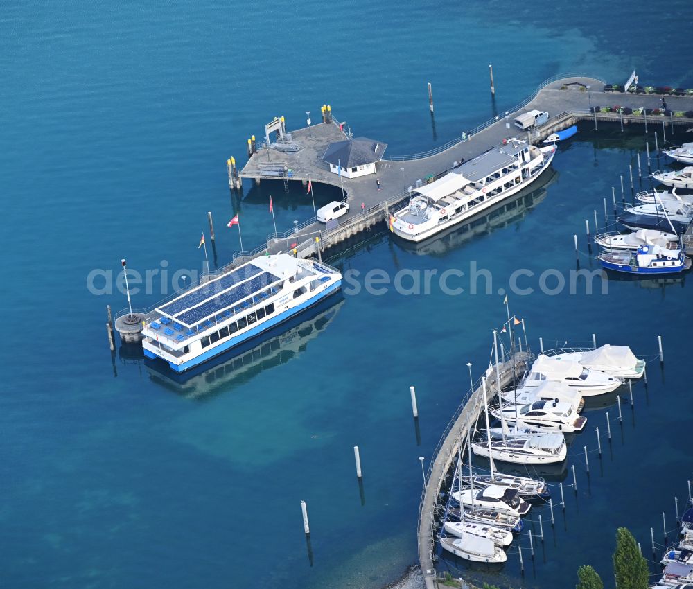 Aerial image Uhldingen-Mühlhofen - Electrically powered passenger and passenger ship Insel Mainau at the landing stage on Lake Constance in the district Unteruhldingen in Uhldingen-Muehlhofen on Lake Constance in the state Baden-Wuerttemberg, Germany