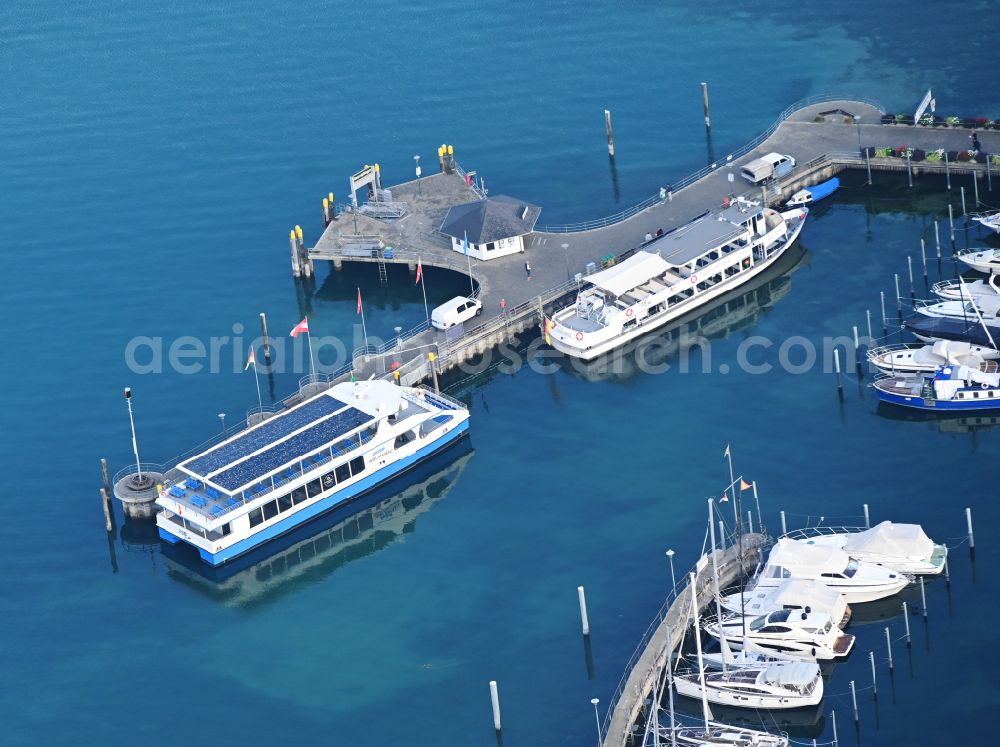 Aerial photograph Uhldingen-Mühlhofen - Electrically powered passenger and passenger ship Insel Mainau at the landing stage on Lake Constance in the district Unteruhldingen in Uhldingen-Muehlhofen on Lake Constance in the state Baden-Wuerttemberg, Germany