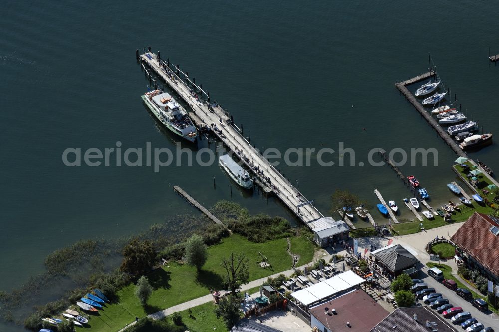 Gstadt am Chiemsee from the bird's eye view: Passenger ship on Schiffsanleger in Gstadt am Chiemsee in the state Bavaria, Germany