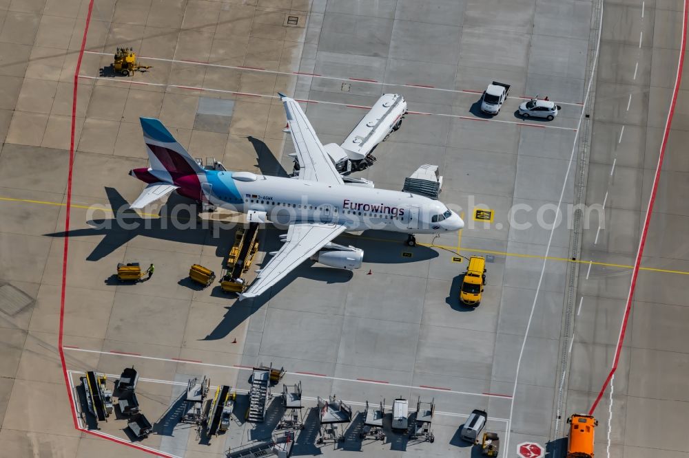 Aerial image Stuttgart - Passenger airplane D-AGWK of Eurowings in parking position - parking area at the airport in Stuttgart in the state Baden-Wuerttemberg, Germany