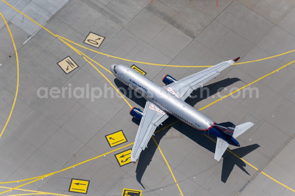 Filderstadt from the bird's eye view: Passenger aircraft Airbus A320-200 of the Russian airline AEROFLOT with the registration VQ-BSU taxiing on the tarmac and apron of the airport in Filderstadt in the state Baden-Wuerttemberg, Germany