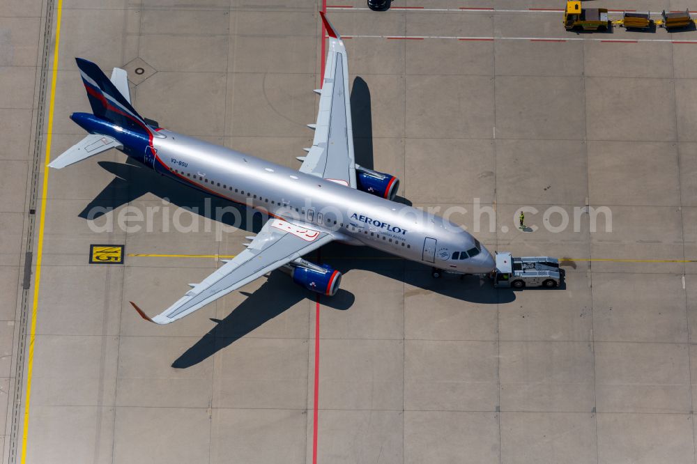 Filderstadt from the bird's eye view: Passenger aircraft Airbus A320-200 of the Russian airline AEROFLOT with the registration VQ-BSU taxiing on the tarmac and apron of the airport in Filderstadt in the state Baden-Wuerttemberg, Germany