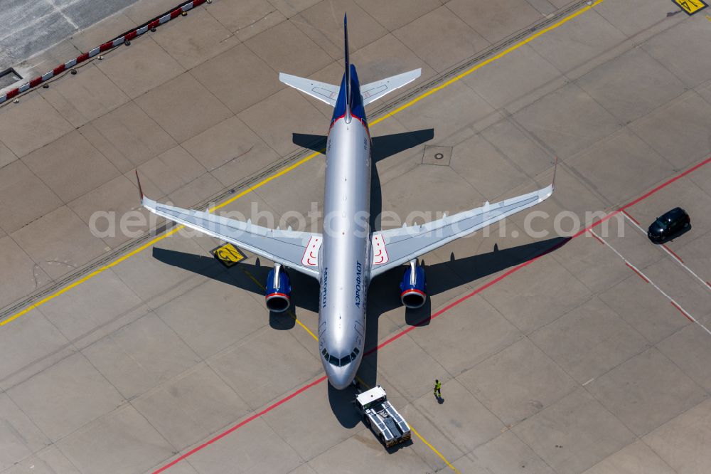 Aerial image Filderstadt - Passenger aircraft Airbus A320-200 of the Russian airline AEROFLOT with the registration VQ-BSU taxiing on the tarmac and apron of the airport in Filderstadt in the state Baden-Wuerttemberg, Germany