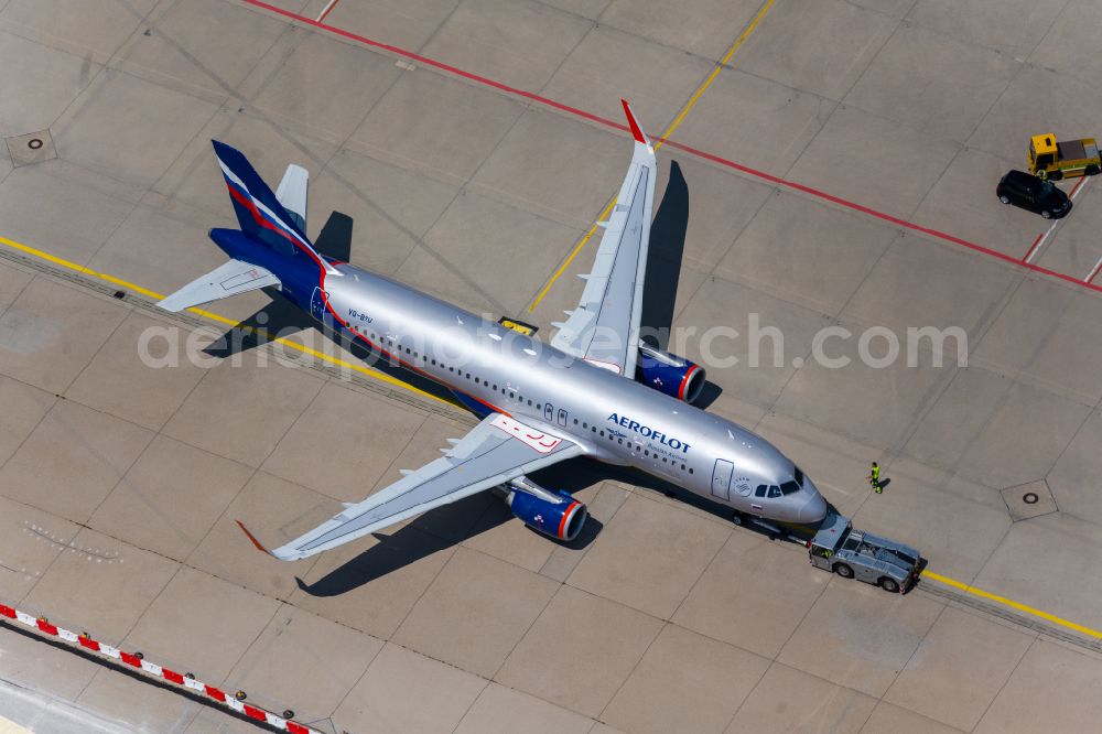 Aerial photograph Filderstadt - Passenger aircraft Airbus A320-200 of the Russian airline AEROFLOT with the registration VQ-BSU taxiing on the tarmac and apron of the airport in Filderstadt in the state Baden-Wuerttemberg, Germany