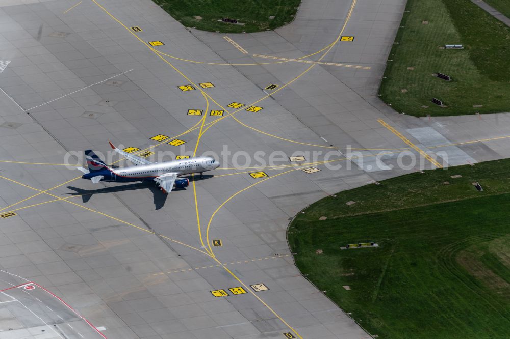 Filderstadt from above - Passenger aircraft Airbus A320-200 of the Russian airline AEROFLOT with the registration VQ-BSU taxiing on the tarmac and apron of the airport in Filderstadt in the state Baden-Wuerttemberg, Germany