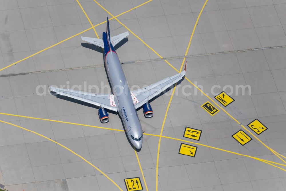 Aerial image Filderstadt - Passenger aircraft Airbus A320-200 of the Russian airline AEROFLOT with the registration VQ-BSU taxiing on the tarmac and apron of the airport in Filderstadt in the state Baden-Wuerttemberg, Germany