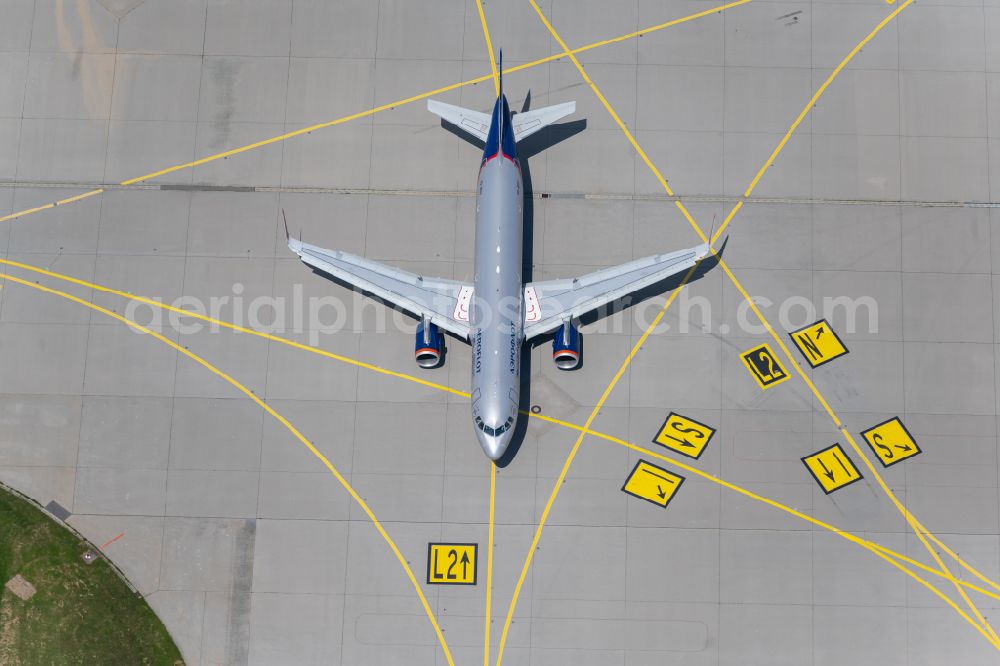 Aerial photograph Filderstadt - Passenger aircraft Airbus A320-200 of the Russian airline AEROFLOT with the registration VQ-BSU taxiing on the tarmac and apron of the airport in Filderstadt in the state Baden-Wuerttemberg, Germany