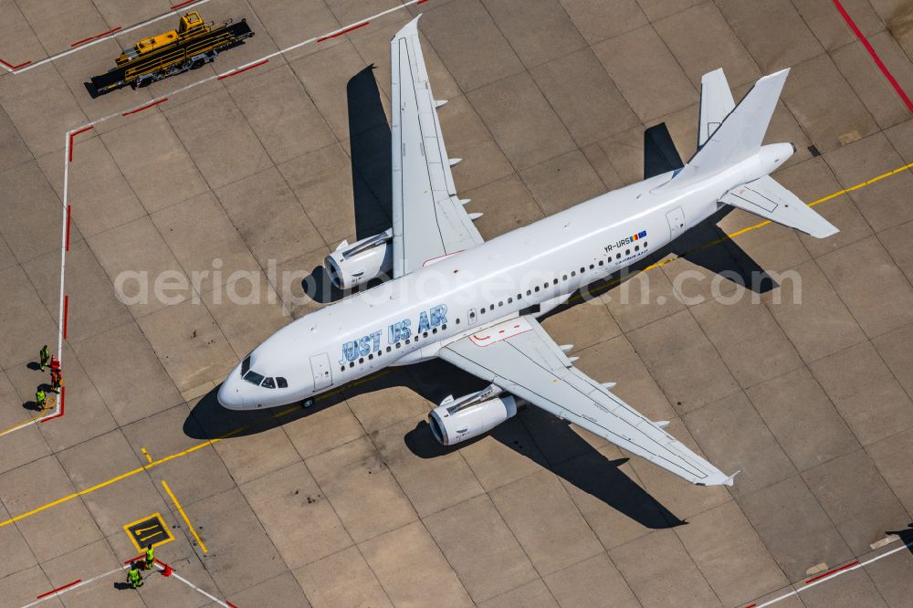 Aerial photograph Leinfelden-Echterdingen - Passenger aircraft Airbus A319 of the romanian airline Just US Air with the registration YR-URS on the take-off position at Stuttgart Airport in Leinfelden-Echterdingen in the state Baden-Wuerttemberg, Germany