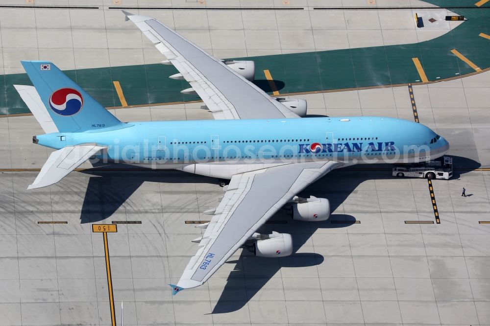 Los Angeles from the bird's eye view: Passenger aircraft Airbus A380-800 of the airline Korean Air taxis at the international airport in Los Angeles in California, United States of America