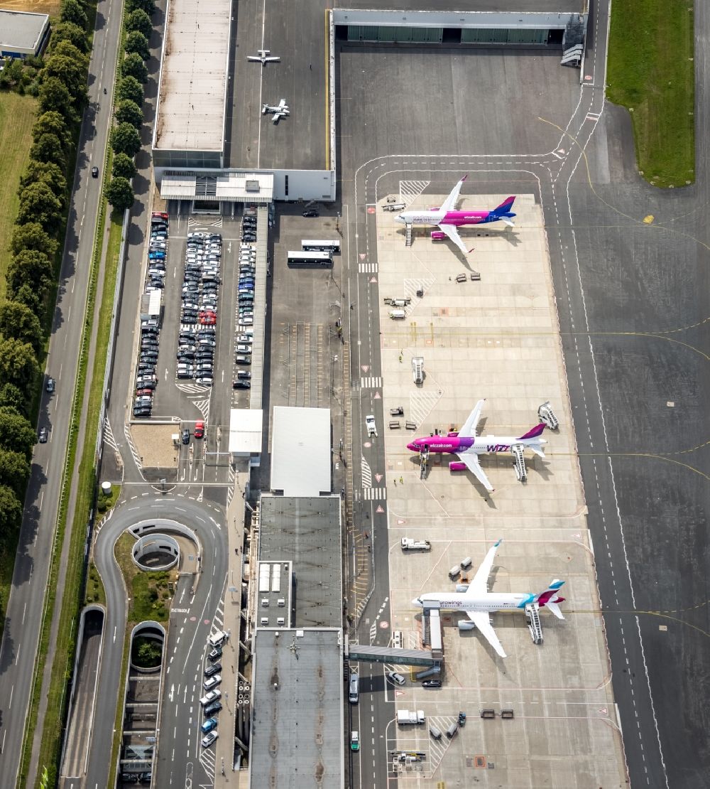 Aerial image Dortmund - Passenger airplane Airbus in parking position - parking area at the airport in Dortmund at Ruhrgebiet in the state North Rhine-Westphalia, Germany