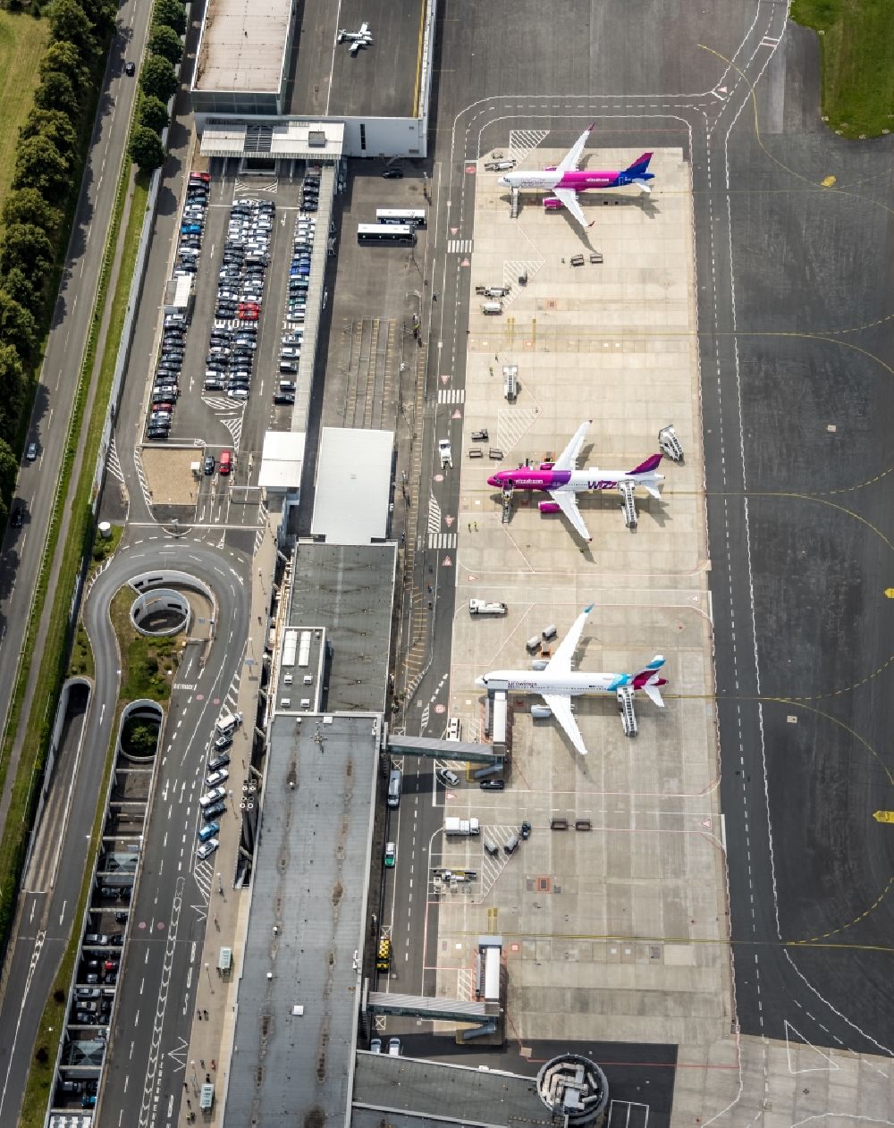 Aerial photograph Dortmund - Passenger airplane Airbus in parking position - parking area at the airport in Dortmund at Ruhrgebiet in the state North Rhine-Westphalia, Germany