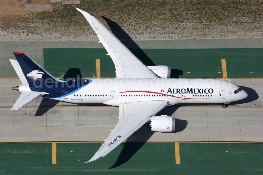 Los Angeles from above - Passenger aircraft Boeing 787-8 of the airline AeroMexico taxis at the international airport in Los Angeles in California, United States of America
