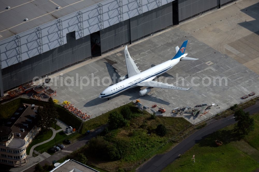 Dresden from the bird's eye view: Passenger airplane B-6501 of China Southern Airlines in parking position - parking area at the airport in Dresden in the state Saxony, Germany