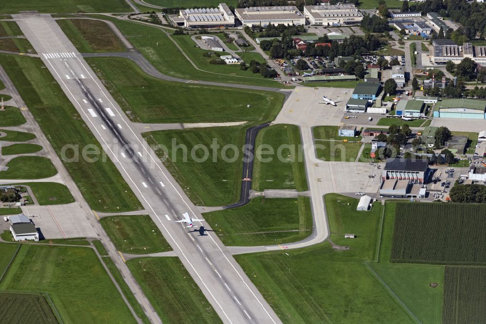 Memmingerberg from above - Airliner - Passenger aircraft A320 von Eurowings at the start and climb over the airport on street Am Flughafen in Memmingerberg in the state Bavaria, Germany