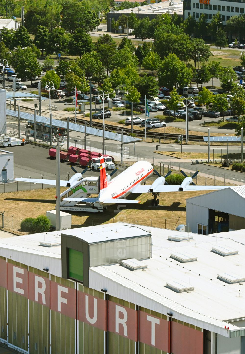 Aerial photograph Erfurt - Passenger airplane of Interflug als Ausstellungsstueck in parking position - parking area at the airport in the district Bindersleben in Erfurt in the state Thuringia, Germany