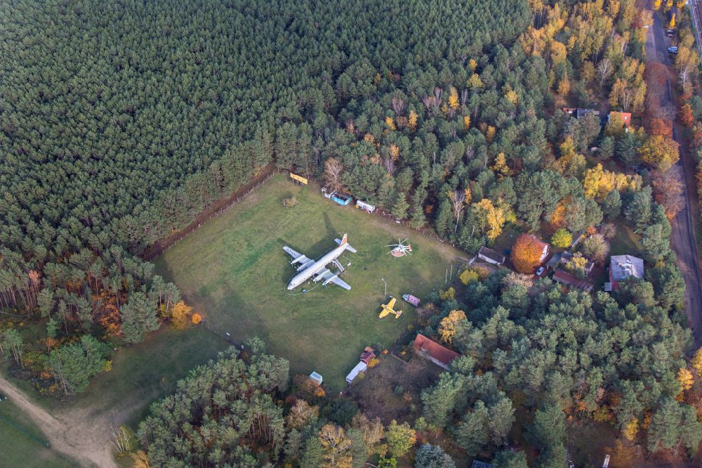 Aerial photograph Borkheide - Passenger aircraft Ilyushin IL-18 with the registration DDR-STE of the former East German airline INTERFLUG on the exhibition grounds of the Hans Grade Museum on Postweg in Borkheide in the state of Brandenburg