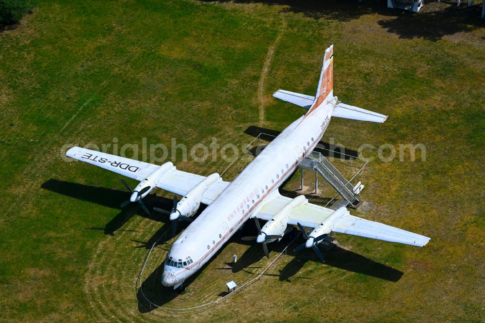 Aerial photograph Borkheide - Passenger aircraft Ilyushin IL-18 with the registration DDR-STE of the former East German airline INTERFLUG on the exhibition grounds of the Hans Grade Museum on Postweg in Borkheide in the state of Brandenburg