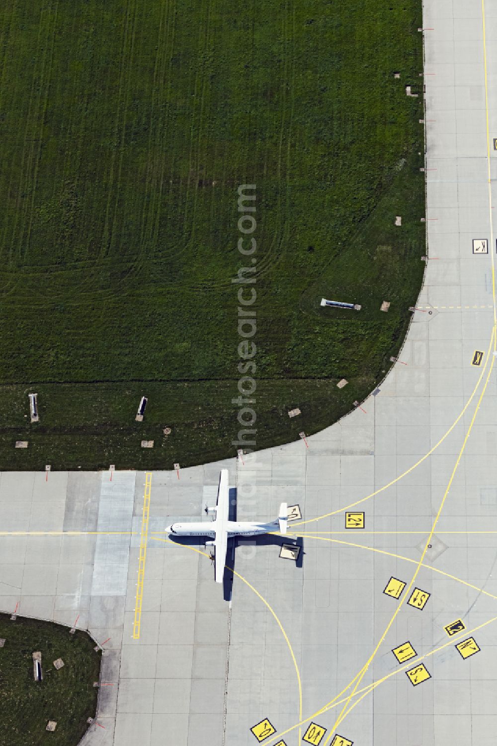 Aerial photograph Filderstadt - Airliner- Passenger aircraft of Luebeck Air rolling on the apron of the airport in Filderstadt in the state Baden-Wuerttemberg, Germany