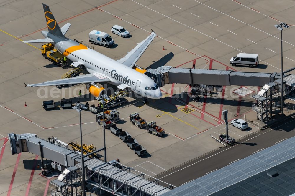 Aerial image Stuttgart - Passenger airplane in parking position - parking area at the airport in Stuttgart in the state Baden-Wurttemberg, Germany