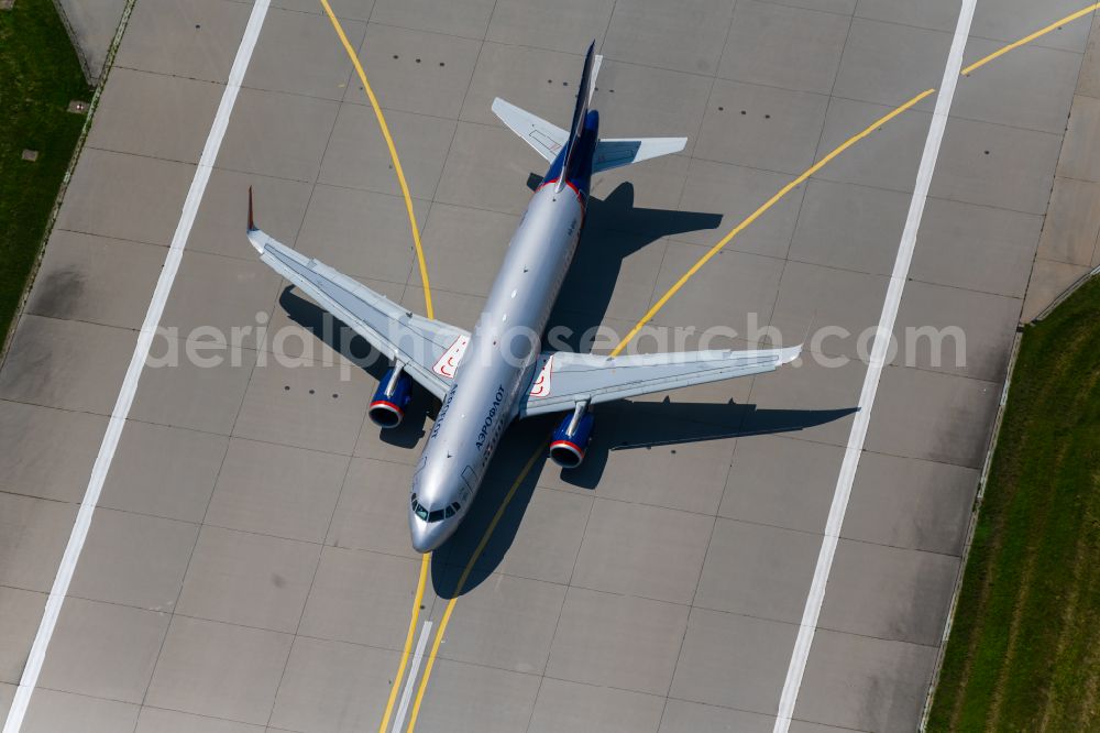 Aerial photograph Filderstadt - Passenger aircraft of the Russian airline Aeroflot of the type Airbus A320-200 with the registration VQ-BSU taking off at Stuttgart Airport in Filderstadt in the state Baden-Wuerttemberg, Germany