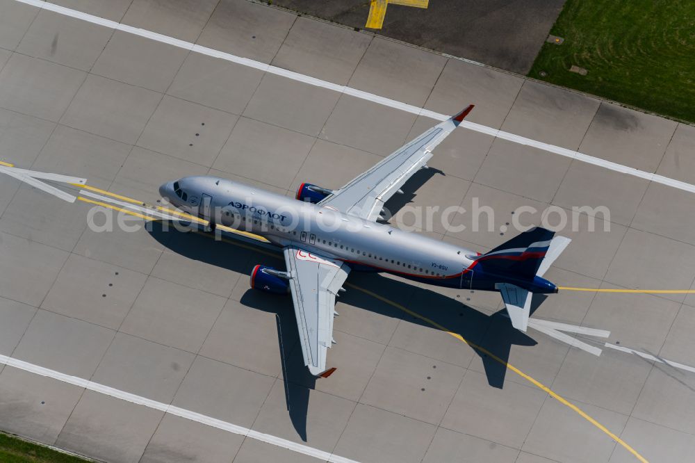Filderstadt from the bird's eye view: Passenger aircraft of the Russian airline Aeroflot of the type Airbus A320-200 with the registration VQ-BSU taking off at Stuttgart Airport in Filderstadt in the state Baden-Wuerttemberg, Germany