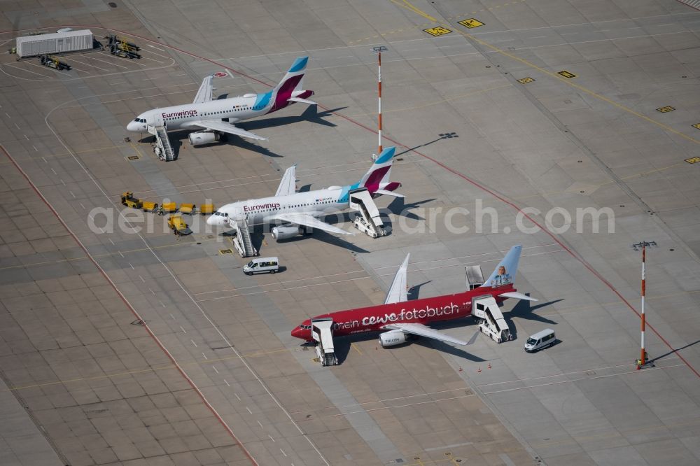 Aerial image Filderstadt - Passenger airplanes from Eurowings in parking position - parking area at the airport in Stuttgart in the state Baden-Wuerttemberg, Germany