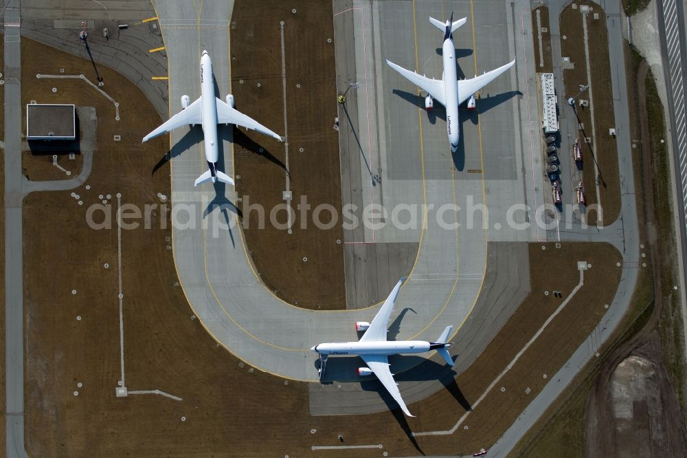 München from above - Passenger aircraft decommissioned due to the crisis on the parking positions and parking space at the airport in Munich in the state Bavaria, Germany
