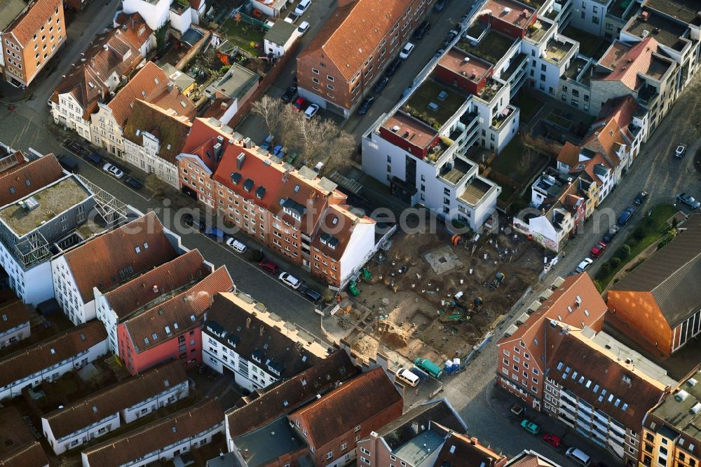 Lübeck from the bird's eye view: Construction site with piling works for the foundation slab of a new building Ellerbrook corner Fischergrube in the district Altstadt in Luebeck in the state Schleswig-Holstein, Germany