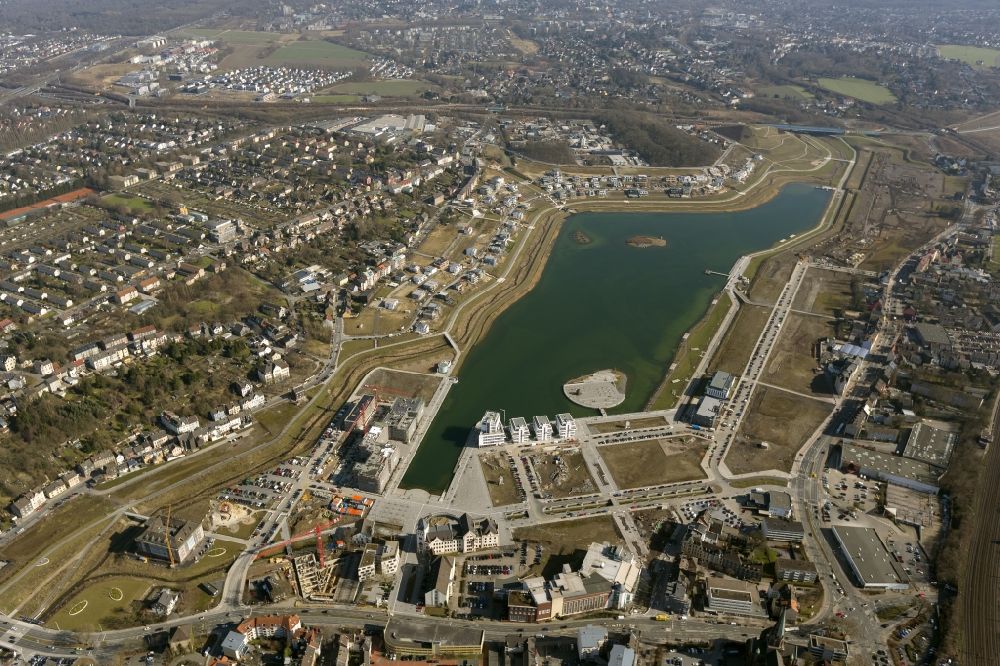 Dortmund from the bird's eye view: View of the Lake Phoenix in Dortmund in the state North Rhine-Westphalia. The Lake Phoenix is an artificial lake on the area of the former steelwork Phoenix-Ost. Together with the circumjacent areal a housing area and a recreational area will be created