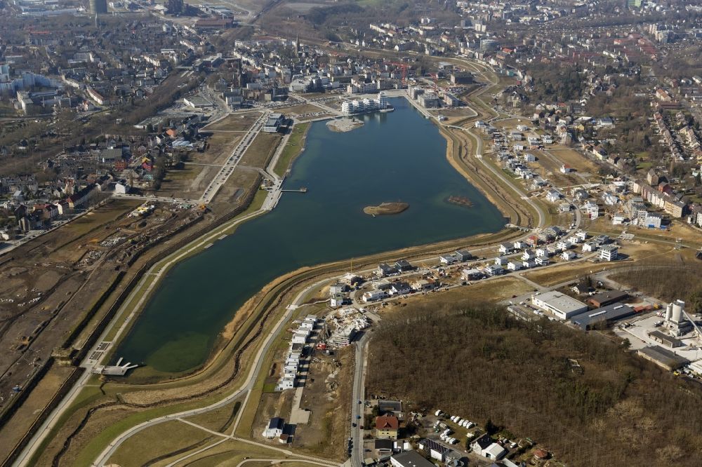 Dortmund from above - View of the Lake Phoenix in Dortmund in the state North Rhine-Westphalia. The Lake Phoenix is an artificial lake on the area of the former steelwork Phoenix-Ost. Together with the circumjacent areal a housing area and a recreational area will be created