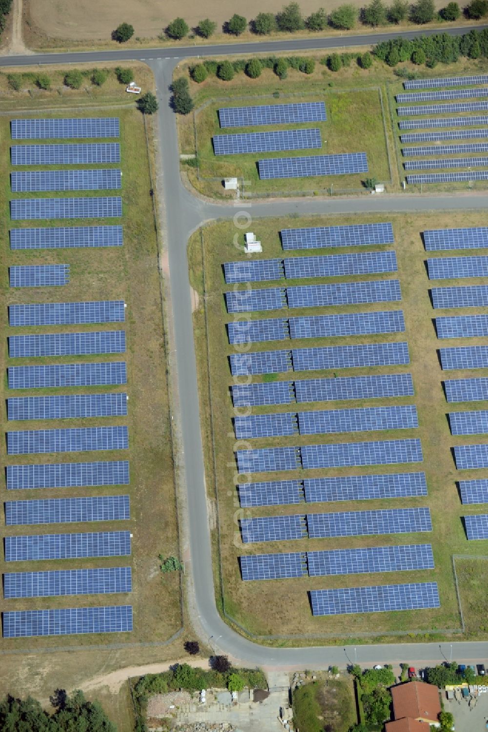 Aerial image Rietz-Neuendorf - Photovoltaic and solar energy plant Solarpark Alt-Golm in Rietz-Neuendorf in the state Brandenburg. The plant with its solar cells is located in the commercial area of Alt-Golm in the North of the borough of Rietz-Neuendorf in the county district of Oder-Spree