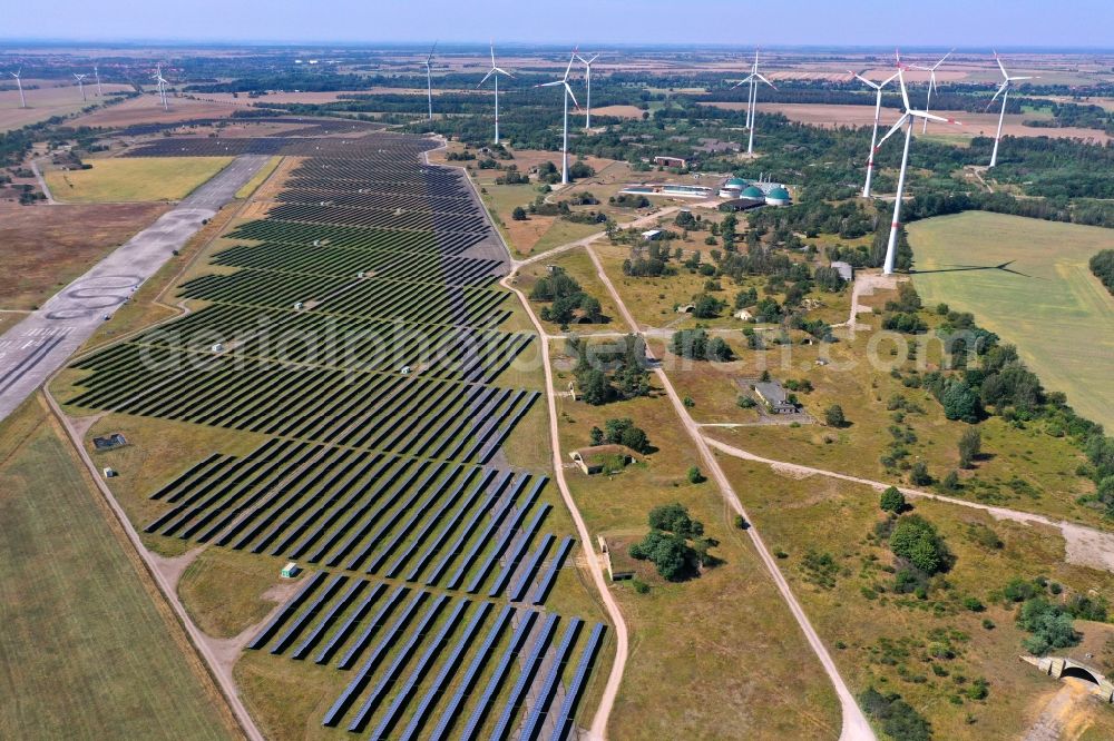 Aerial photograph Zerbst/Anhalt - Zerbst airfield and solar power plant - photovoltaic park and wind farm on the open spaces of Zerbst airfield in the state of Saxony-Anhalt