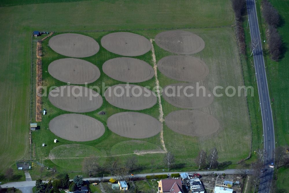 Aerial photograph Eiche - Circular round arch of a pivot irrigation system on agricultural fields in Eiche in the state Brandenburg, Germany