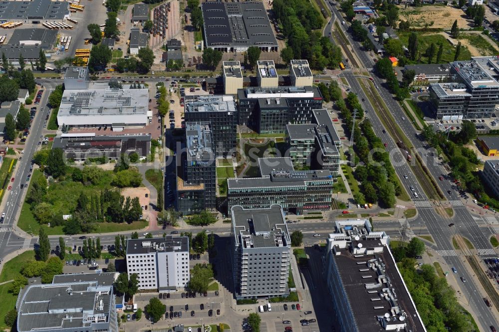 Aerial image Warschau - Platinium Business Park in the Mokotow District of Warsaw in Poland. The office building complex is located in the business district of Mokotow next to the intersection of Domaniewska and Woloska Street. The complex consists of 5 separate buildings with modern ripping glas facade. Its central square includes a small artificial pond. Owner is the Allianz Real Estate GmbH and its caretaker is AIG Lincoln. Main tenants of the buildings are Leo Burnett, Saatchi & Saatchi, Panasonic, Epstein, Aviva