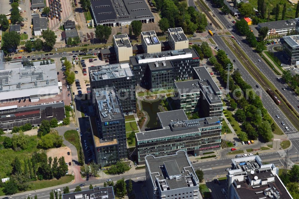 Aerial photograph Warschau - Platinium Business Park in the Mokotow District of Warsaw in Poland. The office building complex is located in the business district of Mokotow next to the intersection of Domaniewska and Woloska Street. The complex consists of 5 separate buildings with modern ripping glas facade. Its central square includes a small artificial pond. Owner is the Allianz Real Estate GmbH and its caretaker is AIG Lincoln. Main tenants of the buildings are Leo Burnett, Saatchi & Saatchi, Panasonic, Epstein, Aviva