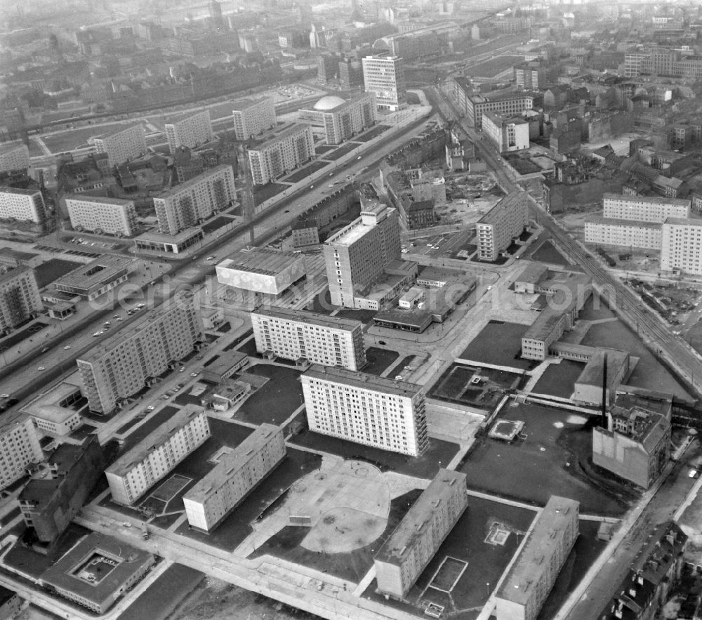 Berlin from the bird's eye view: Skyscrapers in the residential area of industrially manufactured settlement Stalinallee - Karl-Marx-Allee - Berolinastrasse with the hotel Interhotel in the district Mitte in Berlin, Germany
