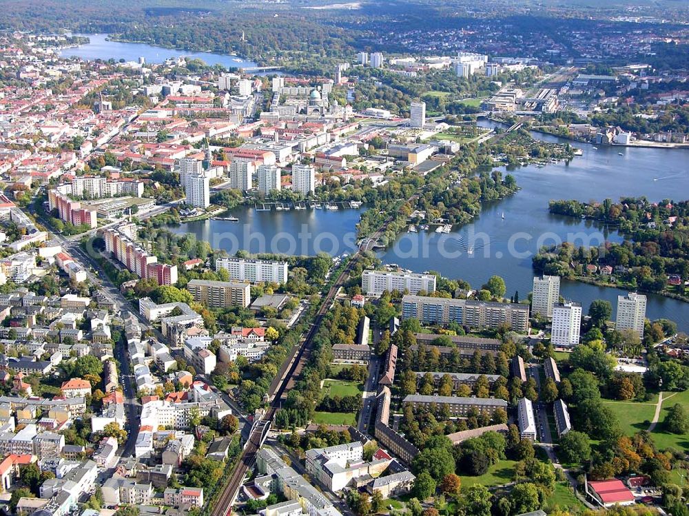 Aerial photograph Potsdam - 07.10.2004 Blick auf die Zeppelinstraße in der Brandenburger Vorstadt mit Blick auf die Neustädter Havelbucht und dem Bahnhof Charlottenhof in Potsdam.