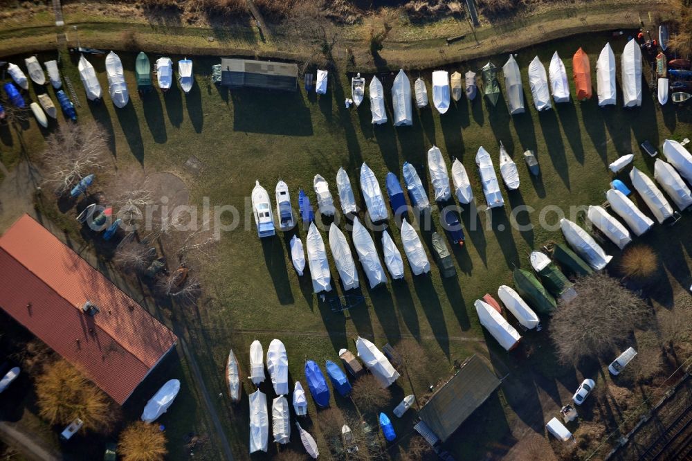 Potsdam from above - Boats at the dock of the 1st Potsdamer Fishing Club at the bank of the Havel river in the state Brandenburg