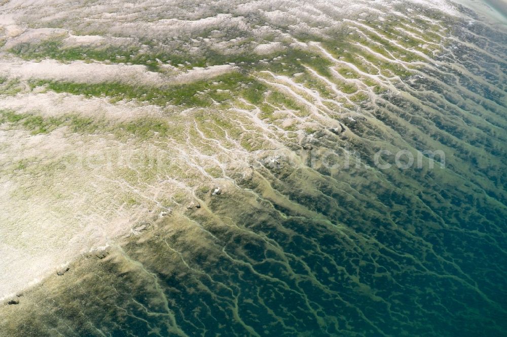 Gröde from above - Formation of tides in the Wadden Sea landscape of North Sea in Groede in the state Schleswig-Holstein, Germany